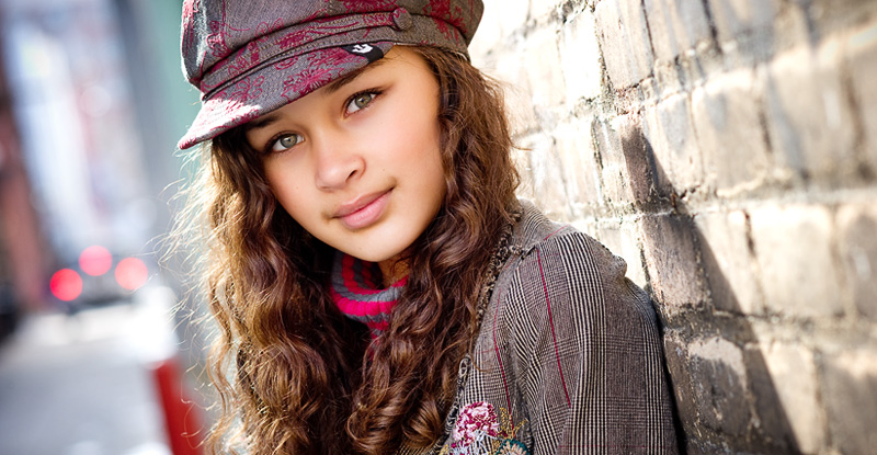 Portrait of middle school–aged girl, taken in alley in downtown Ann Arbor.